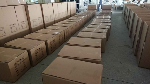 Empaque y carga de contenedor para exportación de equipos estéticos